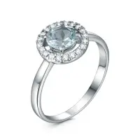 Кольцо из серебра с топазом и фианитами