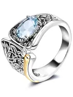 Серебряное кольцо с топазом и фианитами в позолоте