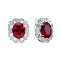 Серьги из серебра с фианитами и корунд рубином Серьги из серебра с фианитами и корунд рубином