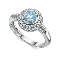 Кольцо из серебра с топазом и фианитами