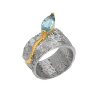 Кольцо из серебра с топазом и позолотой