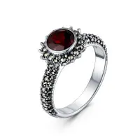 Серебряное кольцо с гарантом и марказитами Серебряное кольцо с гарантом и марказитами