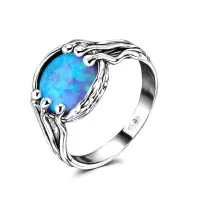 Кольцо из серебра с синтетическим опалом Кольцо из серебра с синтетическим опалом