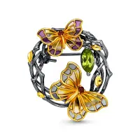 Серебряная брошь с перидотом, эмалью и гранатом «Бабочки» Серебряная брошь с перидотом, эмалью и гранатом «Бабочки»