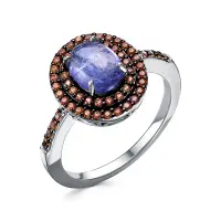 Кольцо из серебра с танзанитом и оранжевыми сапфирами Кольцо из серебра с танзанитом и оранжевыми сапфирами