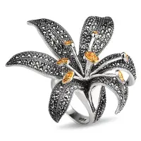 Серебряное кольцо с цитрином, марказитами Swarovski и позолотой Серебряное кольцо с цитрином, марказитами Swarovski и позолотой