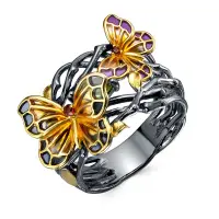 Серебряное кольцо с перидотом, эмалью и гранатом «Бабочки»