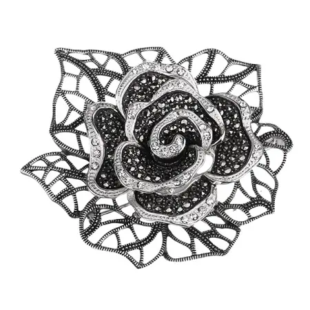 Серебряная брошь с горным хрусталем и марказитами Swarovski