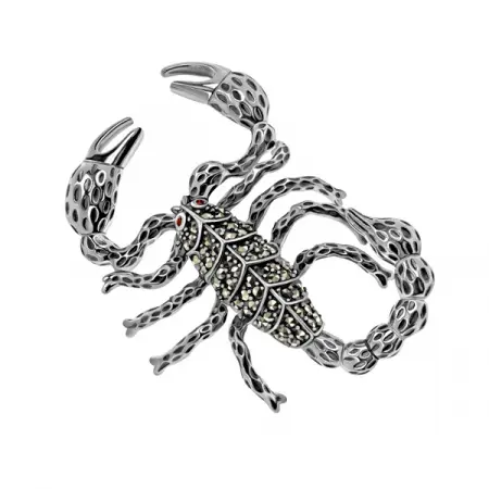 Серебряная брошь с гранатом и марказитами Swarovski