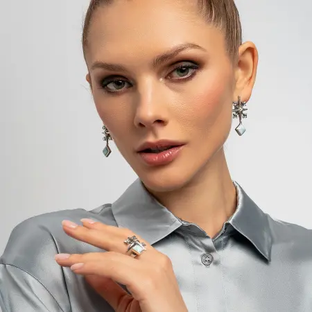 Серебряное кольцо с ларимаром и топазом