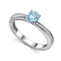 Кольцо из серебра с топазом и фианитами