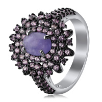 Серебряное кольцо с сапфирами и танзанитом