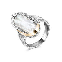 Серебряное кольцо с жемчугом и золотом Серебряное кольцо с жемчугом и золотом