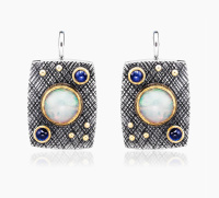 Серебряные серьги с опалом и корундом