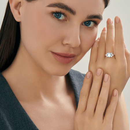 Кольцо из серебра с топазом и фианитами