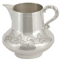 Серебряный молочник
