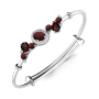 Браслет из серебра с гранатами и фианитами