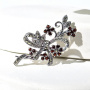 Серебряная брошь с марказитами Swarovski и гранатами
