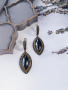 Серебряные серьги с гематитом, марказитами Swarovski и позолотой