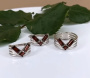 Серебряное кольцо с гранатами «Вектор»