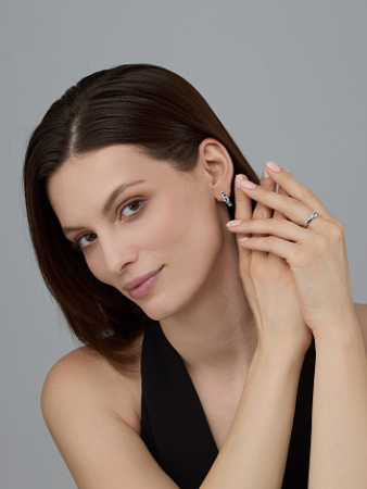 Серебряное кольцо с бриллиантом и топазом