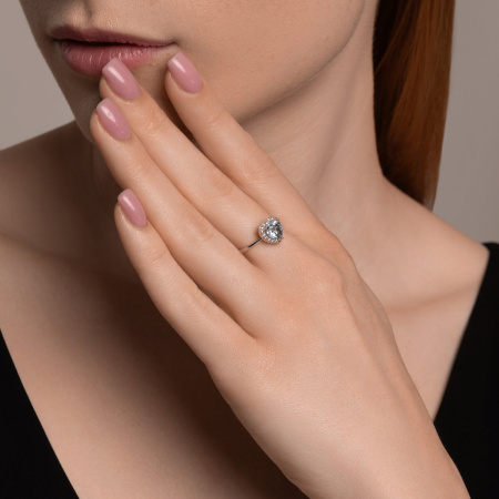 Кольцо из серебра с топазом и фианитами