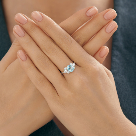 Кольцо из серебра с топазом и фианитами