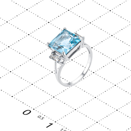Кольцо из серебра с топазом и горным хрусталем