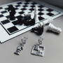 Серебряные ассиметричные серьги «Шахматы»