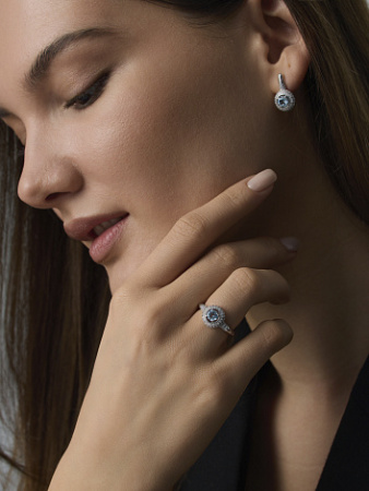 Кольцо из серебра с топазом и фианитами